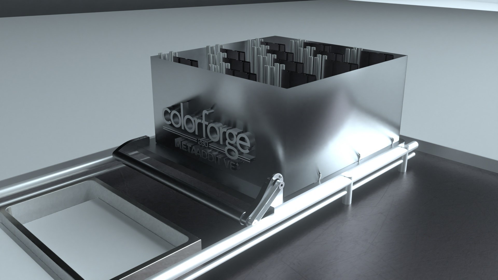 A metallic machine labeled 'colorforge 280 METADOV' with vertical metal rods inside and a flat workspace in front, set on a dark floor with a plain light gray wall background.